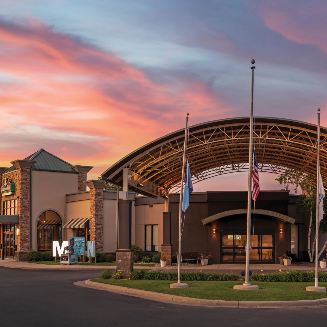 Best Western and Green Mill Fairmont Exteriors at Dusk