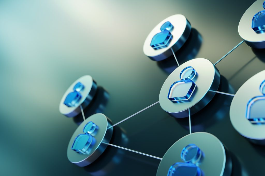 Abstract network of interconnected silver disks with blue gems, connected by thin lines.