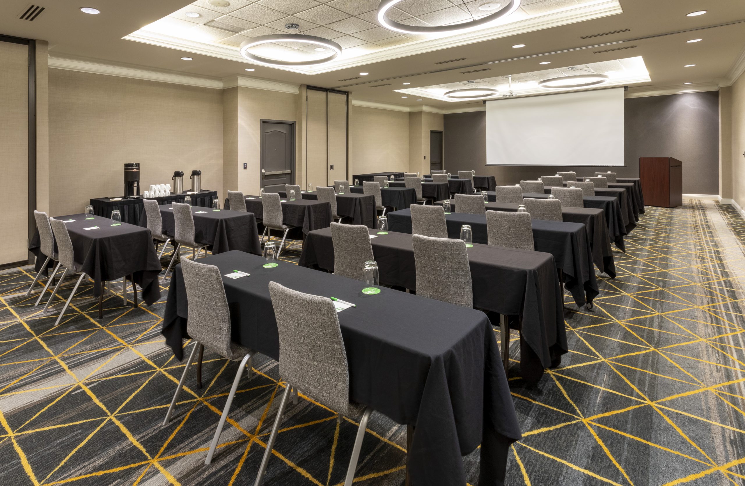 Holiday Inn & Suites Arbor Lakes ballroom set for meetings and events
